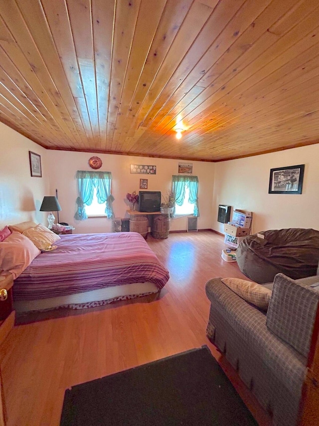 bedroom featuring wooden ceiling and hardwood / wood-style flooring