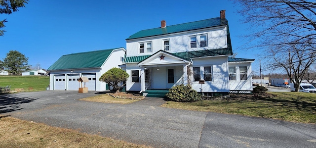 view of front of home featuring covered porch and a front yard