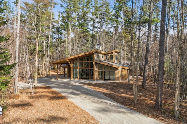 view of front of house with a carport