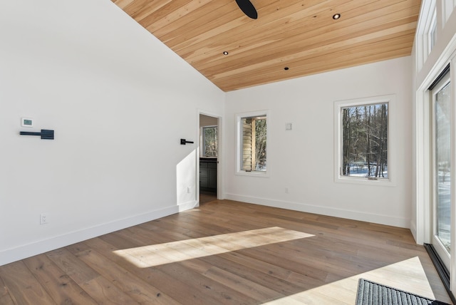 unfurnished room featuring ceiling fan, high vaulted ceiling, wooden ceiling, and light hardwood / wood-style floors