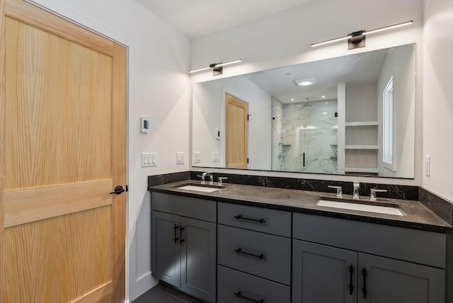 bathroom with vanity and walk in shower