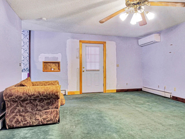 sitting room featuring a baseboard heating unit, ceiling fan, a textured ceiling, an AC wall unit, and dark carpet