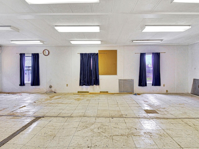 empty room with light tile floors