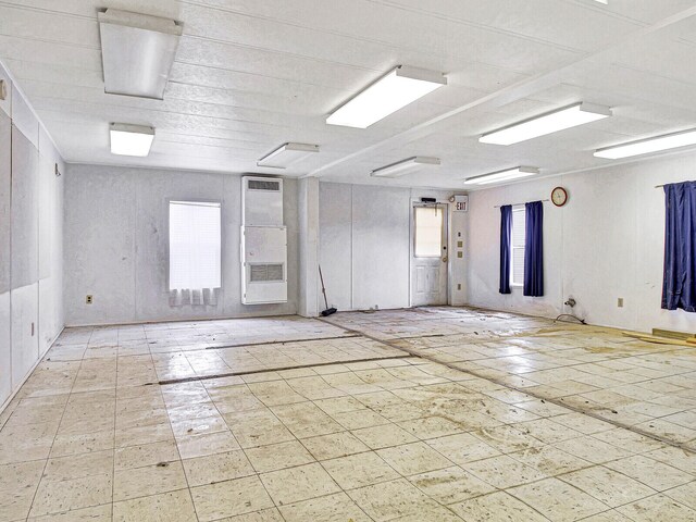 unfurnished room featuring light tile floors