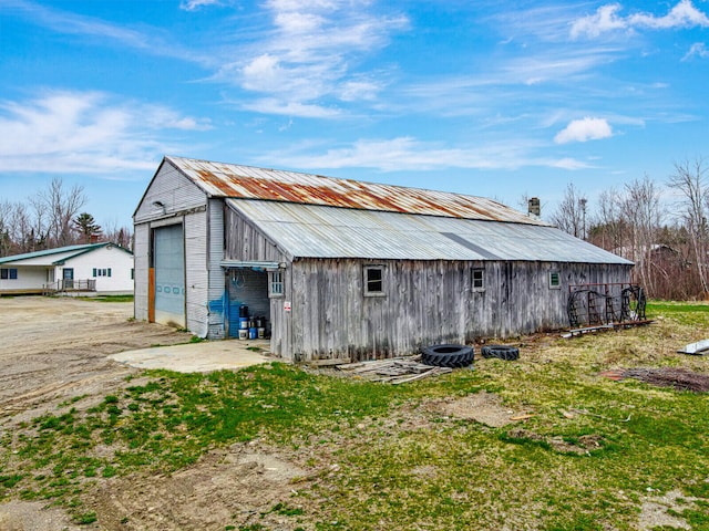 view of shed / structure featuring a garage