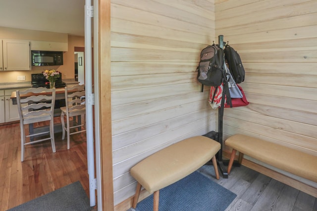 mudroom with hardwood / wood-style flooring