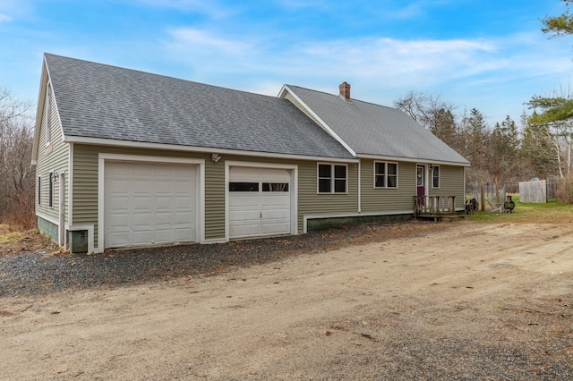 exterior space featuring a garage