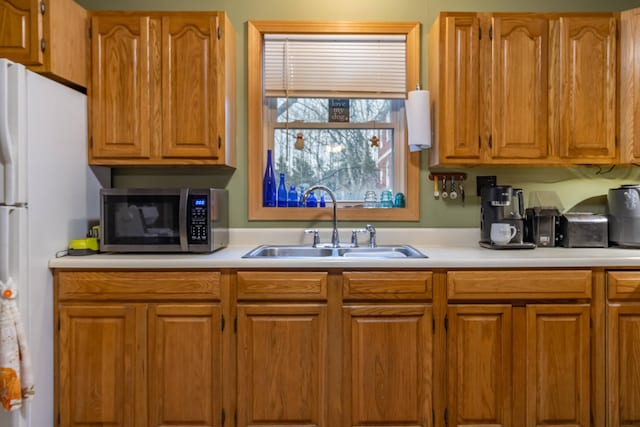 98 Old Rte 1, Gouldsboro, ME 04607 - kitchen featuring white refrigerator and sink