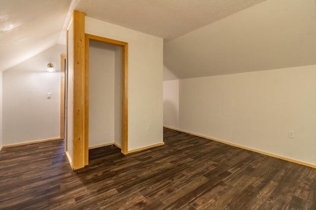 98 Old Rte 1, Gouldsboro, ME 04607 - additional living space with dark hardwood / wood-style floors and vaulted ceiling