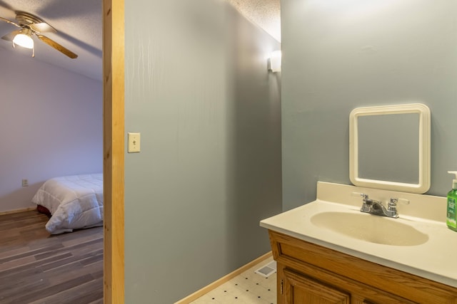 98 Old Rte 1, Gouldsboro, ME 04607 - bathroom featuring tile flooring, ceiling fan, and vanity
