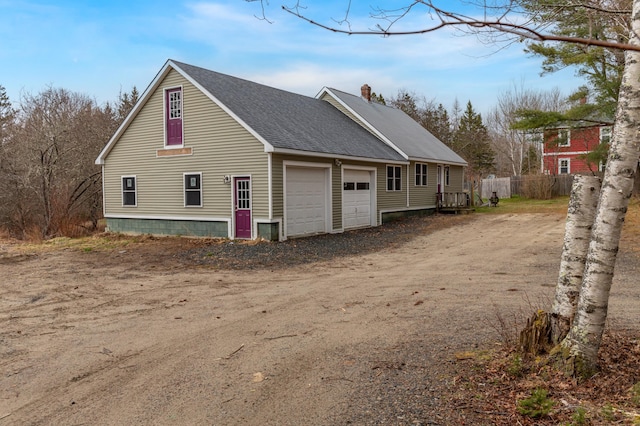 98 Old Rte 1, Gouldsboro, ME 04607 - rear view of property featuring a garage