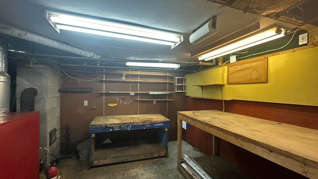 basement with a workshop area