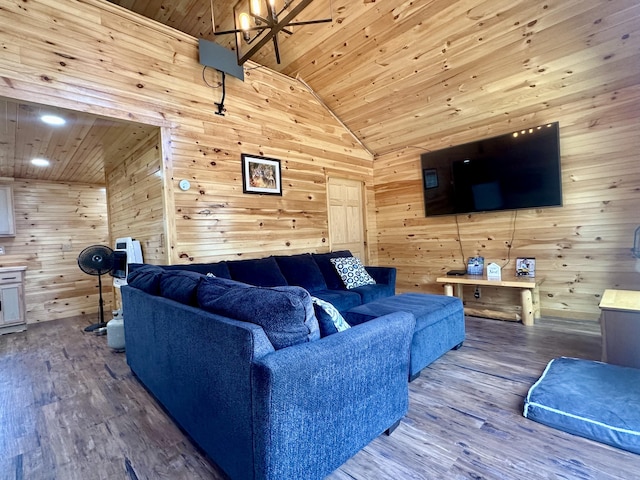 living room featuring high vaulted ceiling, wood-type flooring, wood walls, and wooden ceiling