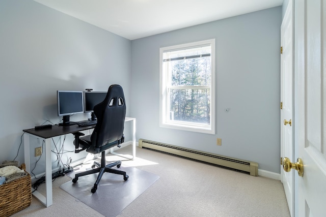 office space featuring a baseboard radiator and carpet floors