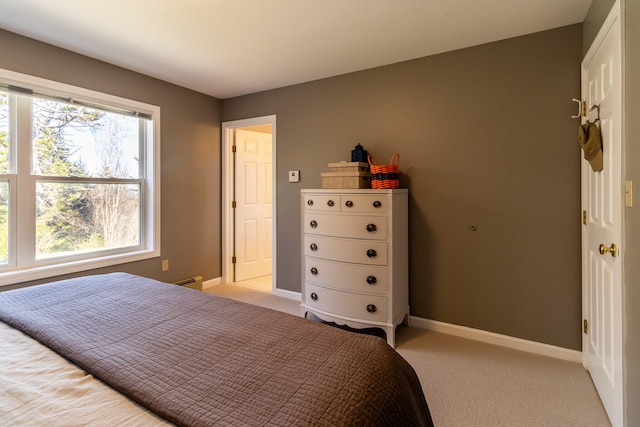 bedroom featuring light colored carpet