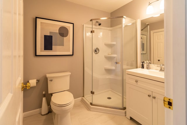 bathroom with an enclosed shower, toilet, tile floors, and large vanity