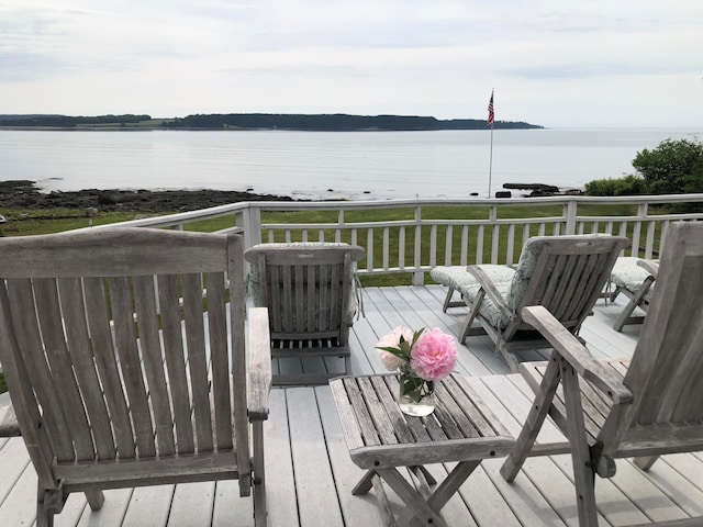 deck featuring a water view