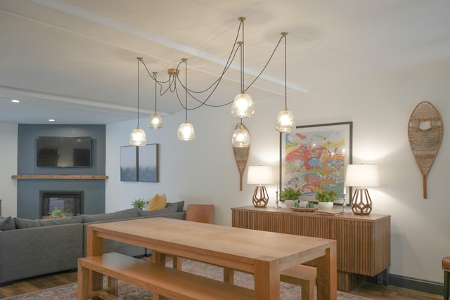 dining room with dark hardwood / wood-style floors