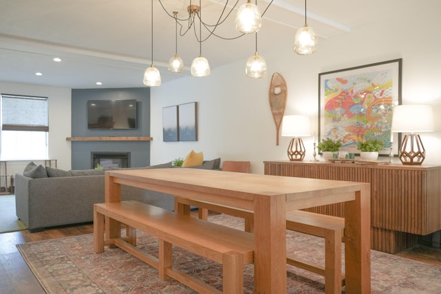 dining space with dark wood-type flooring