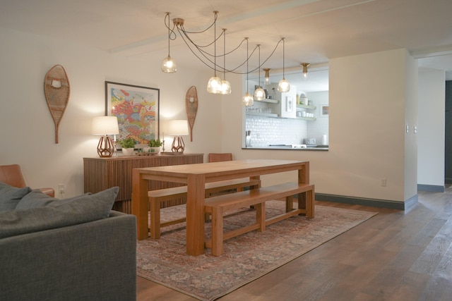 dining room featuring dark wood-type flooring