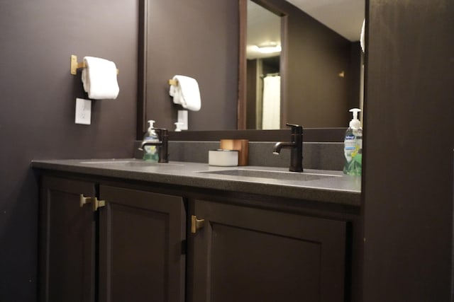 bathroom with vanity with extensive cabinet space