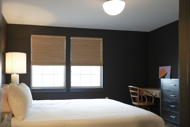 bedroom featuring multiple windows