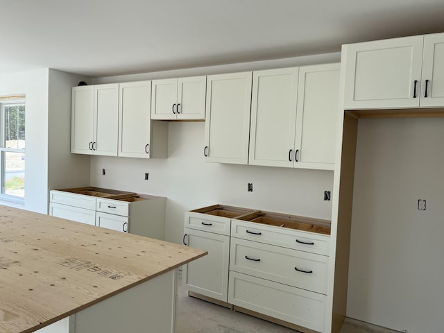 kitchen featuring white cabinetry