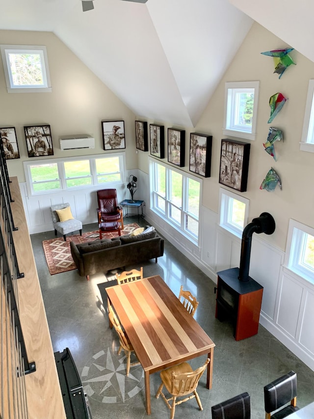 office with a wealth of natural light, wainscoting, and vaulted ceiling