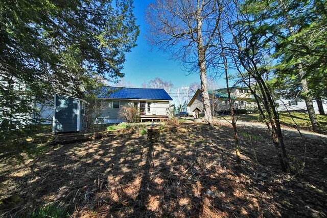 242 Crescent Park Rd, New Limerick, ME 04761 - view of yard featuring a wooden deck