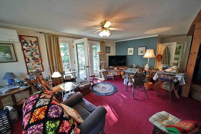 242 Crescent Park Rd, New Limerick, ME 04761 - carpeted living room featuring ceiling fan, ornamental molding, a textured ceiling, and a wall mounted air conditioner