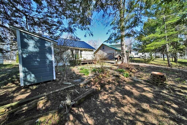 242 Crescent Park Rd, New Limerick, ME 04761 - view of yard with a wooden deck
