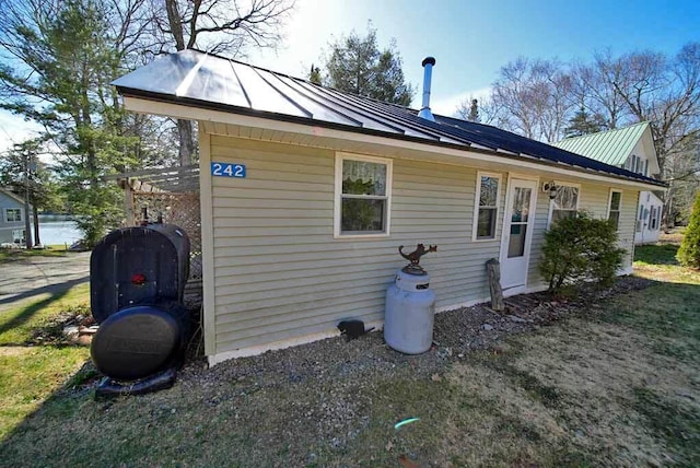 242 Crescent Park Rd, New Limerick, ME 04761 - view of home's exterior featuring a yard