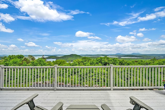 wooden deck featuring a mountain view