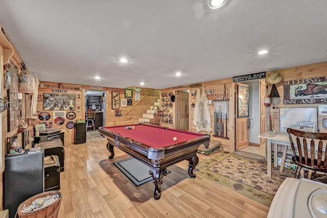 playroom featuring wooden walls, light wood-type flooring, and billiards