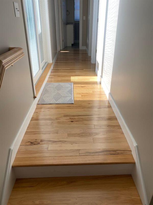 hall featuring light hardwood / wood-style floors