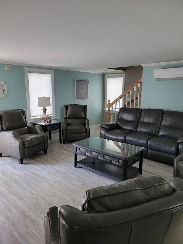 living room featuring an AC wall unit and hardwood / wood-style floors