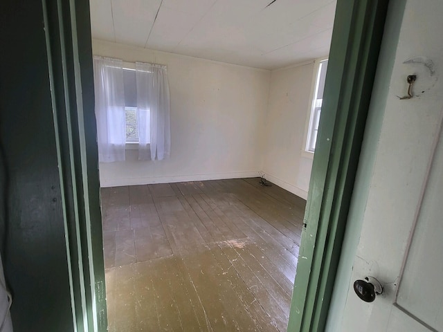 empty room featuring hardwood / wood-style flooring