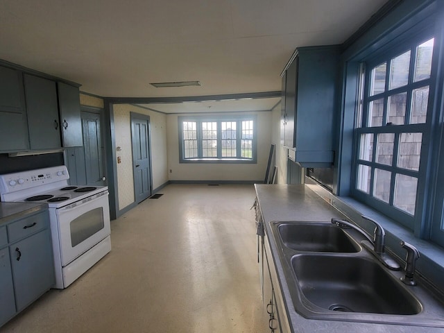 kitchen featuring electric range and sink