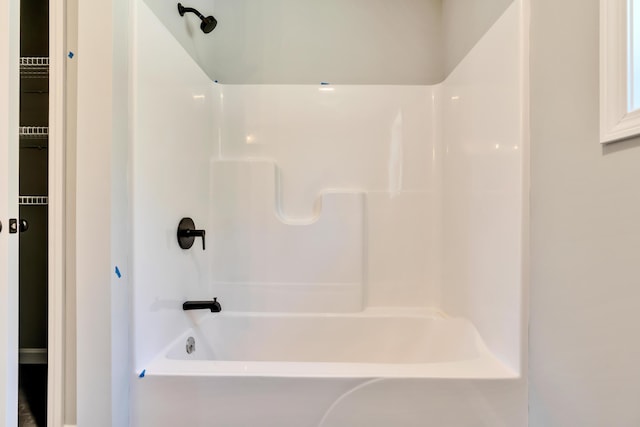 bathroom with shower / bathing tub combination