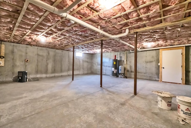 basement featuring electric water heater