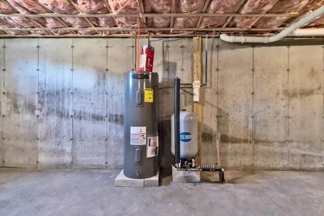 utility room with electric water heater