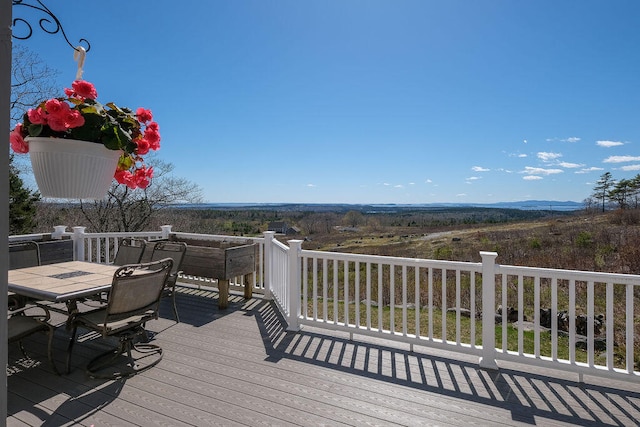 deck with outdoor dining space