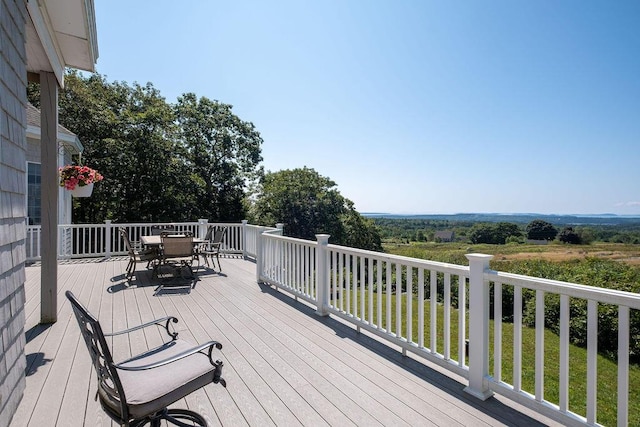 deck featuring outdoor dining area