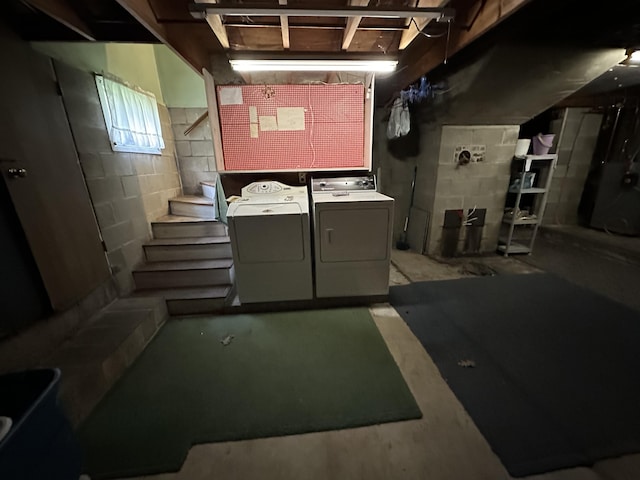 basement featuring washing machine and dryer