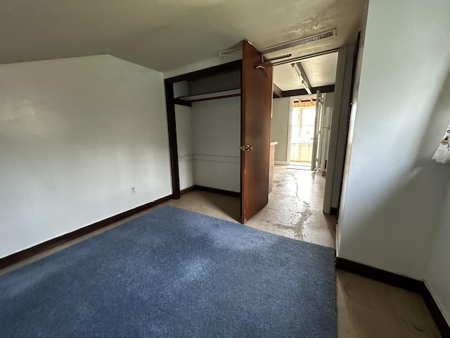 unfurnished bedroom featuring a closet