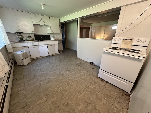 kitchen with a baseboard radiator, white cabinetry, and white range with electric cooktop