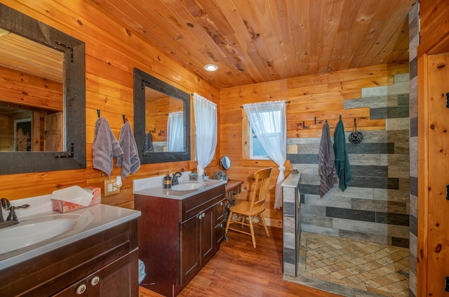 bathroom with wood ceiling, vanity, wooden walls, and hardwood / wood-style floors