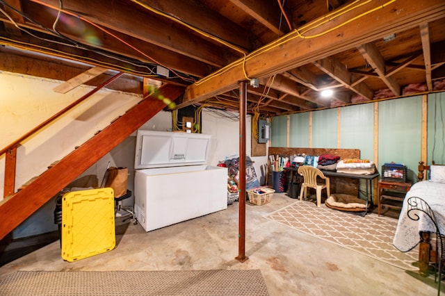 basement with washer / dryer and electric panel