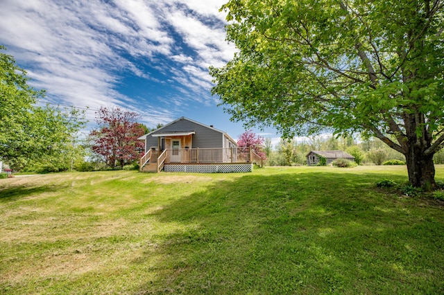 14 Porter St, Searsport, ME 04974 - view of grassy yard with a wooden deck