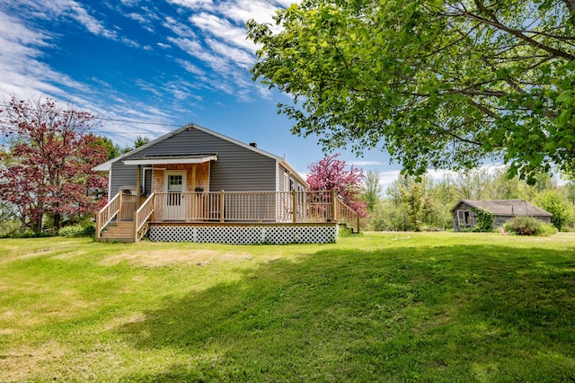 14 Porter St, Searsport, ME 04974 - view of front of home featuring a front yard and a wooden deck